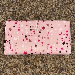 Kate Spade large slim bifold wallet in star print